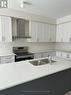 1341 Davis Loop, Innisfil, ON  - Indoor Photo Showing Kitchen With Double Sink 