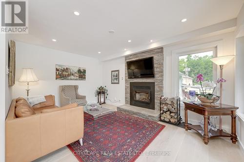 77 Polish Avenue, Penetanguishene, ON - Indoor Photo Showing Living Room With Fireplace