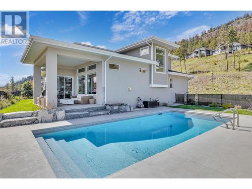 99 Forest Edge Place, Kelowna, BC - Outdoor With In Ground Pool With Deck Patio Veranda