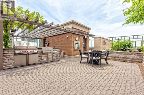 323 - 385 Prince Of Wales Drive, Mississauga, ON - Outdoor With In Ground Pool
