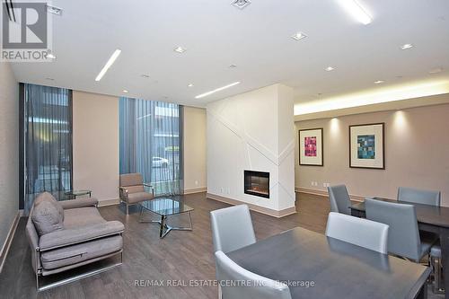 2010 - 75 Eglinton Avenue W, Mississauga, ON - Indoor With Fireplace