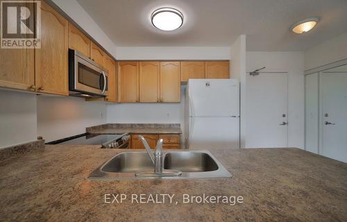 708 - 935 Sheppard Avenue W, Toronto, ON - Indoor Photo Showing Kitchen With Double Sink