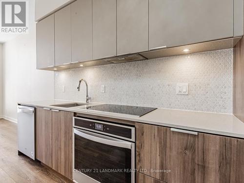 104 - 2 Sonic Way, Toronto, ON - Indoor Photo Showing Kitchen With Upgraded Kitchen