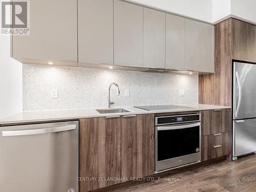 104 - 2 Sonic Way, Toronto, ON - Indoor Photo Showing Kitchen With Stainless Steel Kitchen With Upgraded Kitchen
