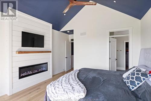 5759 5Th Concession Road, Essex, ON - Indoor Photo Showing Bedroom With Fireplace