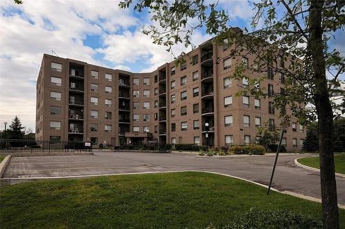 3497 Upper Middle Road|Unit #202, Burlington, ON - Outdoor With Balcony With Facade