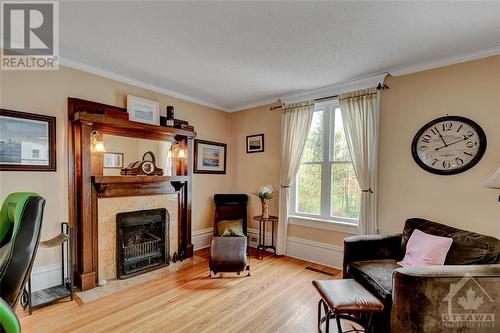 35 Ogden Avenue, Smiths Falls, ON - Indoor Photo Showing Living Room With Fireplace