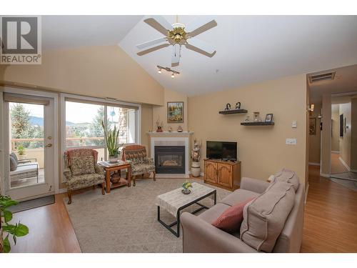 3301 Centennial Drive Unit# 406, Vernon, BC - Indoor Photo Showing Living Room With Fireplace