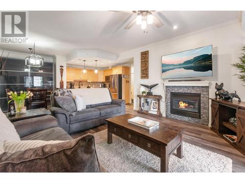 277 Yorkton Avenue Unit# 102, Penticton, BC - Indoor Photo Showing Living Room With Fireplace
