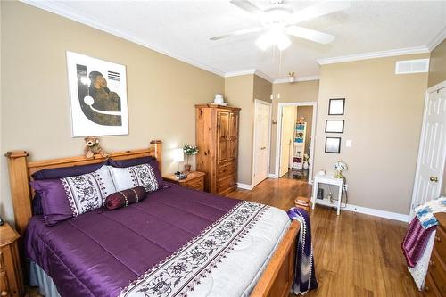 generous sized main floor primary bedroom with ensuite - 5 Greentrail Drive, Mount Hope, ON - Indoor Photo Showing Bedroom