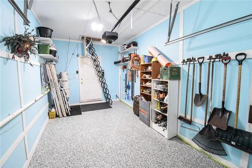 garage with vinyl floor - 5 Greentrail Drive, Mount Hope, ON - Indoor Photo Showing Other Room