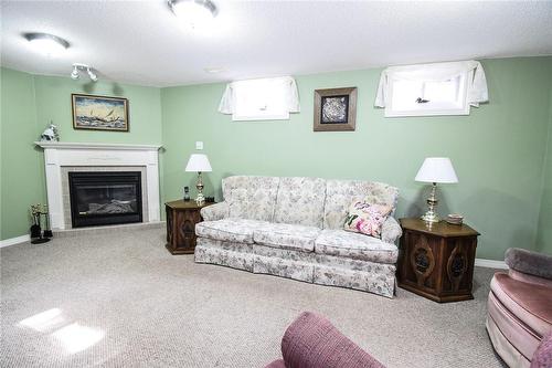 5 Greentrail Drive, Mount Hope, ON - Indoor Photo Showing Living Room With Fireplace