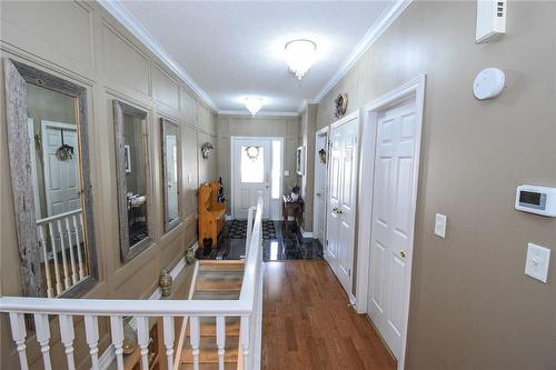 Rich hardwood flooring - 5 Greentrail Drive, Mount Hope, ON - Indoor Photo Showing Other Room