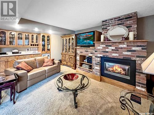 1536 Sibbald Crescent, Prince Albert, SK - Indoor Photo Showing Living Room With Fireplace