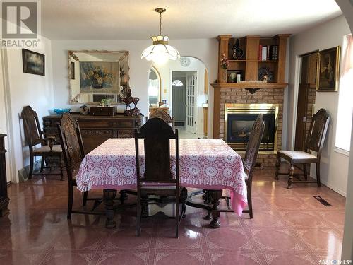 28 Highway Avenue W, Preeceville, SK - Indoor Photo Showing Dining Room With Fireplace