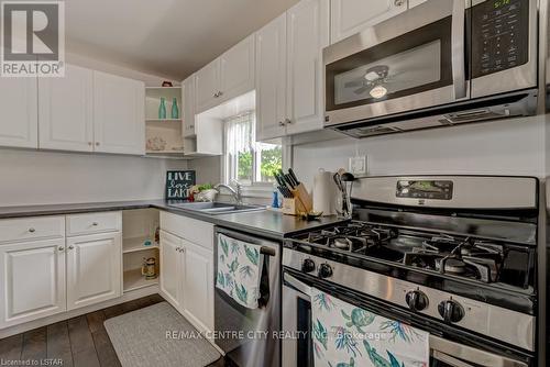 143 William Street, Central Elgin, ON - Indoor Photo Showing Kitchen With Double Sink