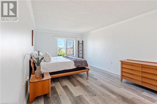 101 - 9 Pine Street, Lambton Shores (Grand Bend), ON - Indoor Photo Showing Bedroom