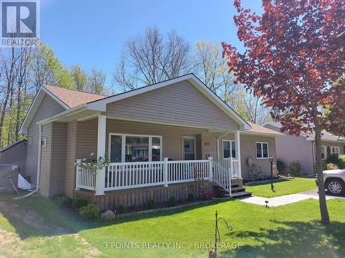 329 Wyldwood Lane, South Huron (Stephen Twp), ON - Outdoor With Deck Patio Veranda With Facade