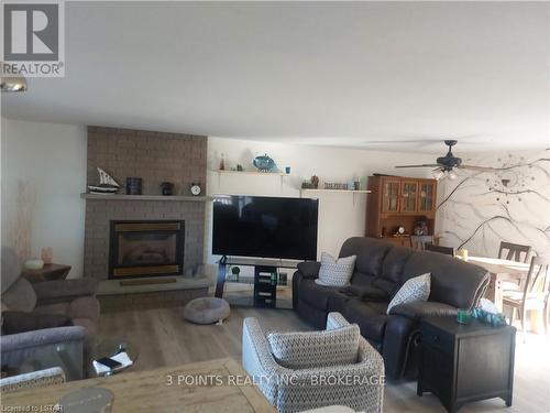 329 Wyldwood Lane, South Huron, ON - Indoor Photo Showing Living Room With Fireplace