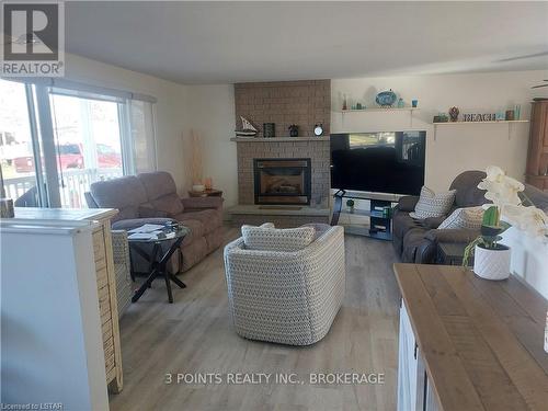 329 Wyldwood Lane, South Huron, ON - Indoor Photo Showing Living Room With Fireplace