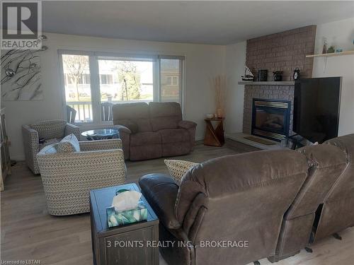 329 Wyldwood Lane, South Huron, ON - Indoor Photo Showing Living Room With Fireplace