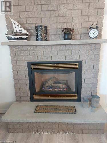 Imported from itso - 329 Wyldwood Lane, South Huron (Stephen Twp), ON - Indoor Photo Showing Living Room With Fireplace