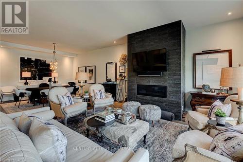 207 - 1705 Fiddlehead Place, London, ON - Indoor Photo Showing Living Room With Fireplace