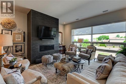 207 - 1705 Fiddlehead Place, London, ON - Indoor Photo Showing Living Room With Fireplace