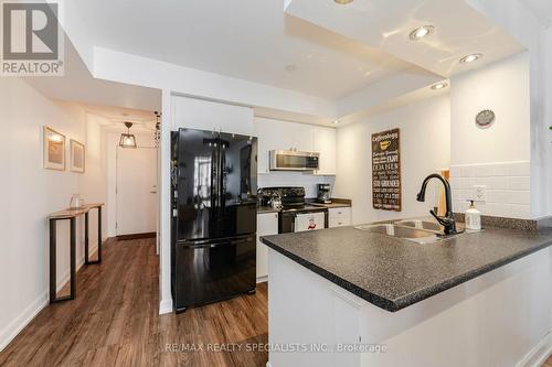 1025 - 5233 Dundas Street, Toronto, ON - Indoor Photo Showing Kitchen With Double Sink