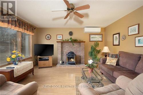 413 Shannon Boulevard, South Huron, ON - Indoor Photo Showing Living Room With Fireplace