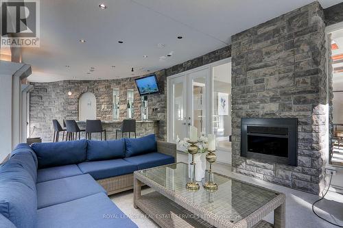52 Innisbrook Drive, Wasaga Beach, ON - Indoor Photo Showing Living Room With Fireplace