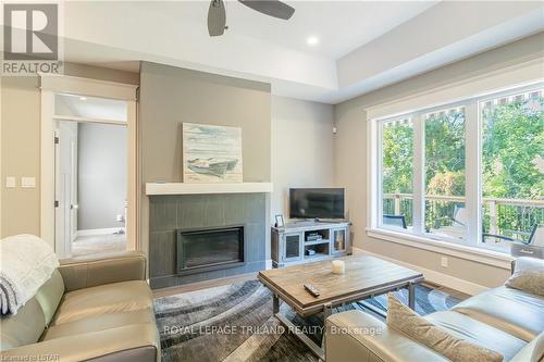 3 - 52 Sunrise Lane, Lambton Shores, ON - Indoor Photo Showing Living Room With Fireplace