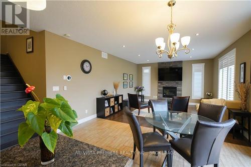 968 Springbank Avenue N, Woodstock, ON - Indoor Photo Showing Dining Room With Fireplace