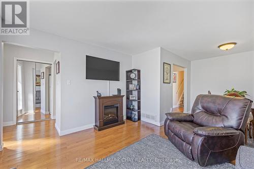 38 Lionel Stone Avenue E, New Tecumseth, ON - Indoor Photo Showing Living Room With Fireplace
