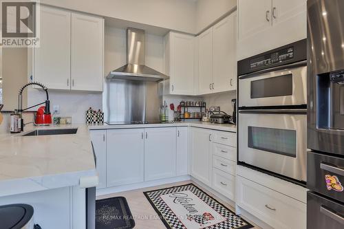 Th 10 - 8 Rean Drive, Toronto, ON - Indoor Photo Showing Kitchen With Stainless Steel Kitchen