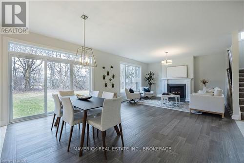 2195 Lockwood Crescent, Strathroy-Caradoc, ON - Indoor Photo Showing Dining Room With Fireplace