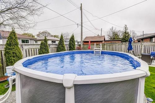 123 Currie Street, Hamilton, ON - Outdoor With Above Ground Pool