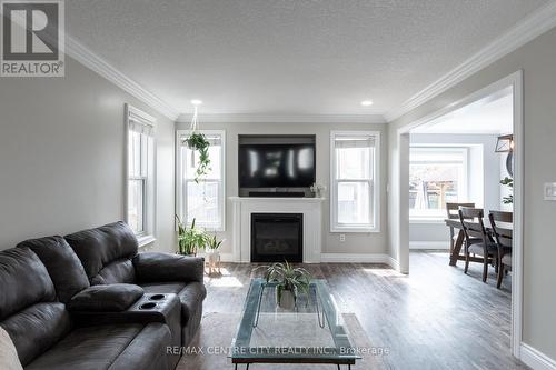 763 Garibaldi Avenue, London, ON - Indoor Photo Showing Living Room With Fireplace