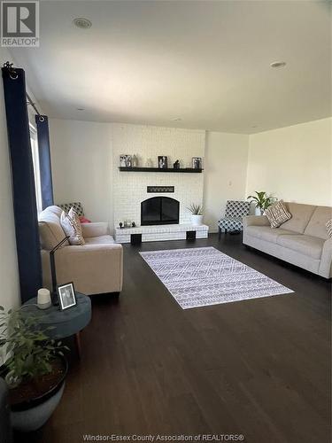1415 Azalia Crescent, Windsor, ON - Indoor Photo Showing Living Room With Fireplace