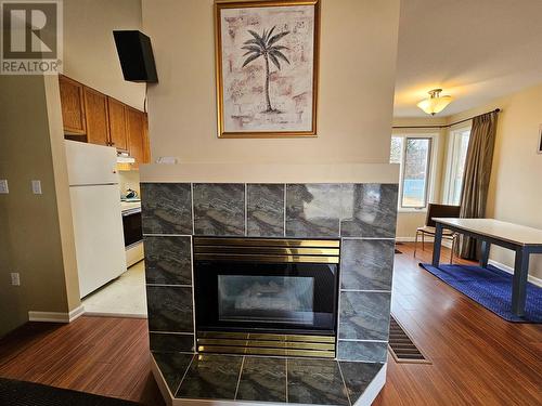 5112 43 Street Ne, Chetwynd, BC - Indoor Photo Showing Other Room With Fireplace