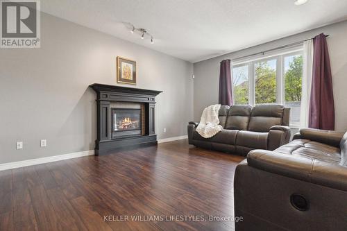1750 Tigerlily Road, London, ON - Indoor Photo Showing Living Room With Fireplace