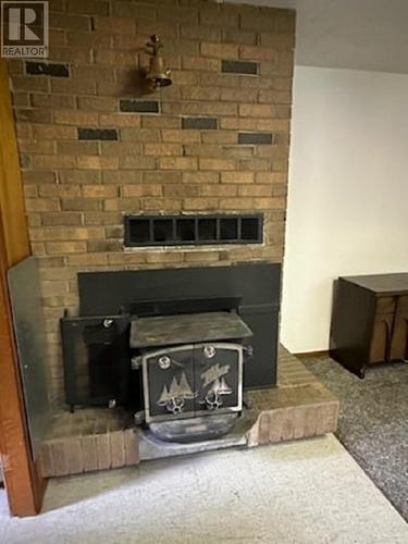 217 6Th Street, Nakusp, BC - Indoor With Fireplace