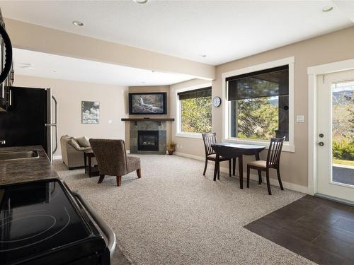 9837 Crofton Road, Lake Country, BC - Indoor With Fireplace