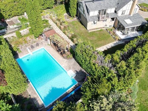 ExtÃ©rieur - 8 Rue Magnolia, Baie-D'Urfé, QC - Outdoor With In Ground Pool