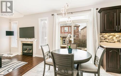 18 Stephanie Avenue, Brampton, ON - Indoor Photo Showing Dining Room With Fireplace