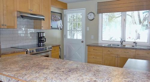 4950 Siminoff Road, Grand Forks, BC - Indoor Photo Showing Kitchen With Double Sink
