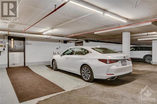 Parking Spot - 111 Echo Drive Unit#105, Ottawa, ON - Indoor Photo Showing Garage