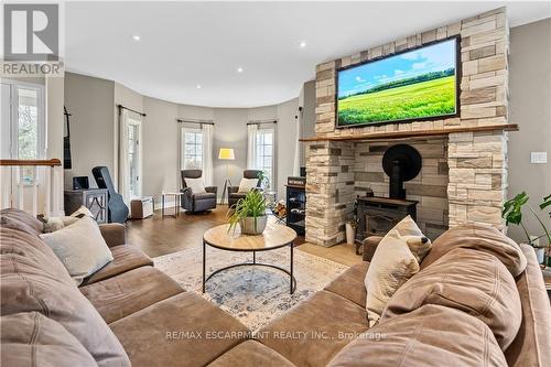 768 Old #8 Highway, Hamilton, ON - Indoor Photo Showing Living Room With Fireplace