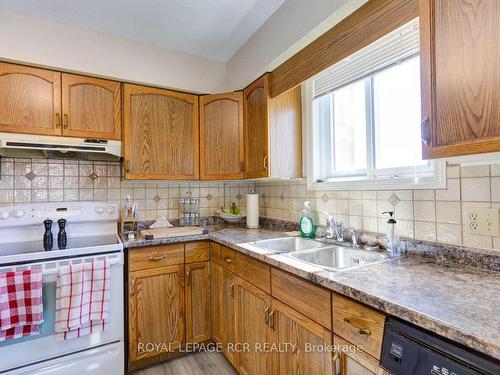 203-497 Birmingham St W, Wellington North, ON - Indoor Photo Showing Kitchen With Double Sink