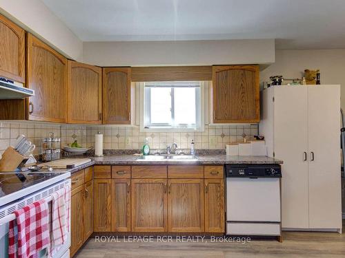 203-497 Birmingham St W, Wellington North, ON - Indoor Photo Showing Kitchen With Double Sink